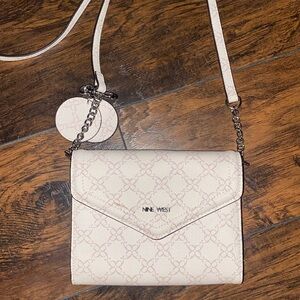 Nine west light pink handbag/purse never used